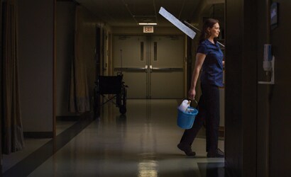 health care professional walking on clean floor
