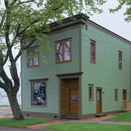 green storefront building