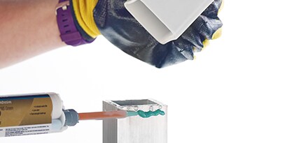 bonding metal and plastic parts with adhesive
