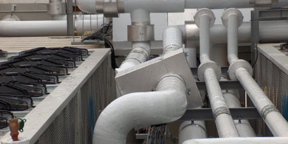 3M™ VentureClad™ Insulation Jacketing Tapes covering exposed area of insulation on pipes. 
