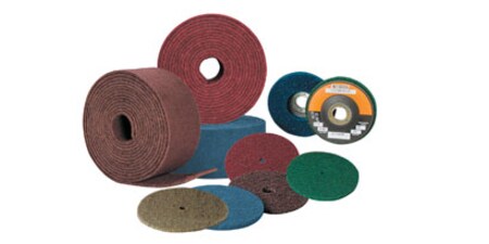 Image of a variety of abrasive discs and belts
