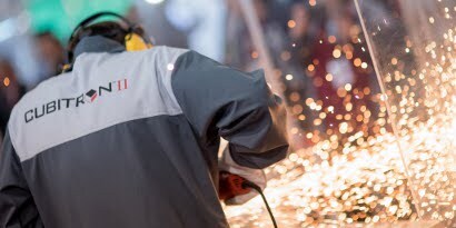 Man grinding metal with sparks
