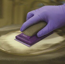 using 180 grade abrasive to sand glaze