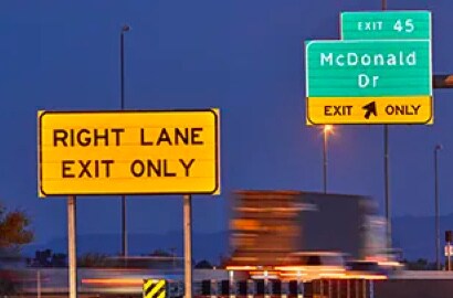 A close-up of a road sign.
