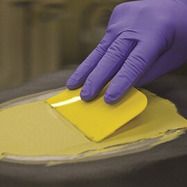 applying filler to the damaged area using the 3M Dynamic Mixing System